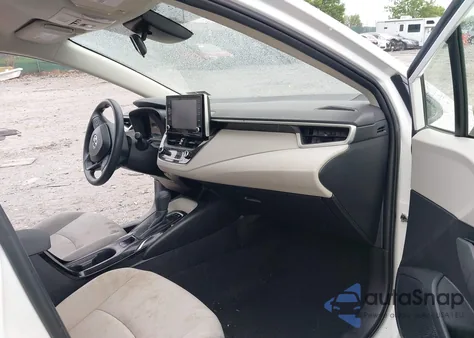 2021 Toyota Corolla Hybrid Le from USA, damaged, VIN JTDEAMDE7MJ009617